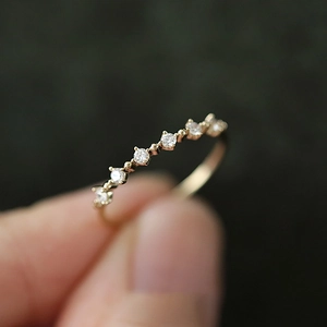 Delicate 18K gold plated silver ring with micro-set zircon crystals in a minimalist row
