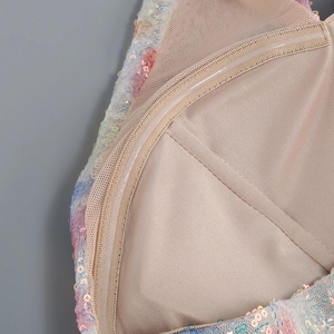 Detail of colorful sequins and soft mesh lining on the elegant sequin party dress