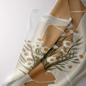 Detail of bohemian daisy floral tapestry fabric with soft texture and refined stitching