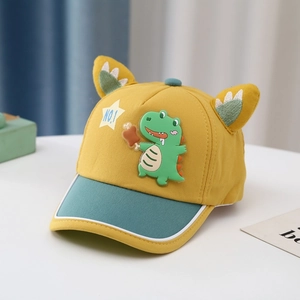 Detail of yellow toddler baseball cap with 3D ears and cartoon dinosaur patch