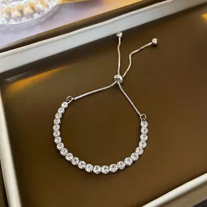 Adjustable silver tennis bracelet with sparkling cubic zirconia stones and sliding clasp