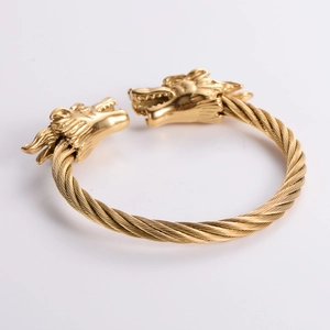 18k gold plated stainless steel dragon head cable cuff bracelet in a 45-degree side view