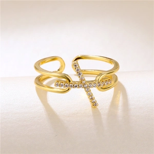 Gold plated criss-cross ring with zircon stones in a double layer intertwined design