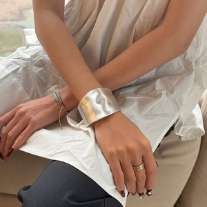 Minimalist matte silver irregular wave wide metal bangle for women with brushed finish