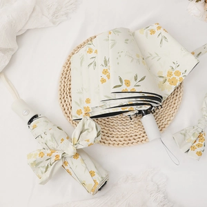 Automatic cream floral folding umbrella with yellow flower patterns and UV protection