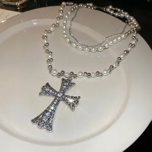 Elegant multilayer beaded necklace with crystal cross pendant and imitation pearls
