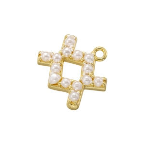 Detailed view of a gold-plated hash symbol pendant with white pearls inlay for DIY jewelry