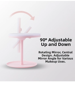 Detail of pink LED makeup mirror showing 90-degree vertical rotation for angle adjustment