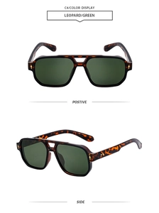 Vue détaillée de lunettes de soleil double pont léopard avec verres verts et rivets