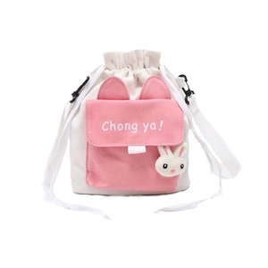 Sac seau mignon en toile blanc et rose avec oreilles et tête de lapin décorative