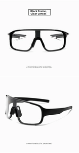 Detail of sports cycling sunglasses with black frames and clear lenses for wind protection