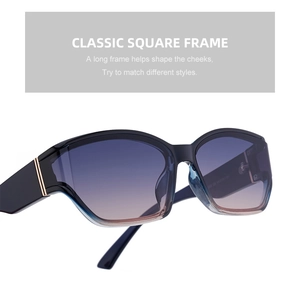 Detail of square black frame sunglasses featuring blue to orange gradient resin lenses