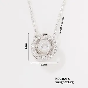 Macro shot showing 0.9x1.0cm round pendant with central zircon and 40+5cm chain details