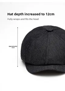 Detail view of black denim newsboy cap showing a 12cm deep crown and twill texture