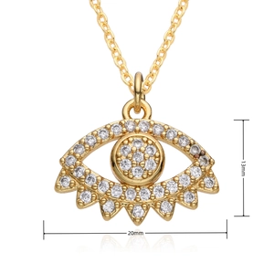 Macro view of 13mm by 20mm evil eye pendant with 18K gold plating and white zircon micro-pave