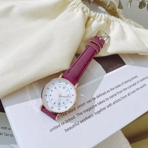Elegant women's quartz watch with gold case, white dial and burgundy leather strap