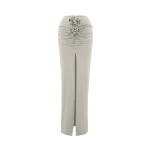 Detail of light grey high-waist midi skirt featuring 3D flowers and front slit design
