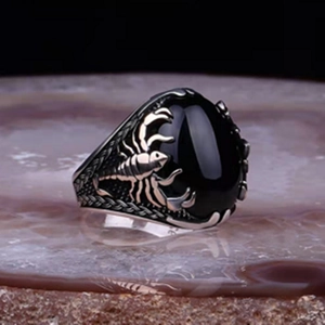 Men's punk scorpion ring with large oval black stone and vintage silver woven band