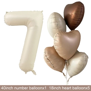 Detail of 40-inch cream number 7 balloon with 18-inch heart-shaped foil party balloons