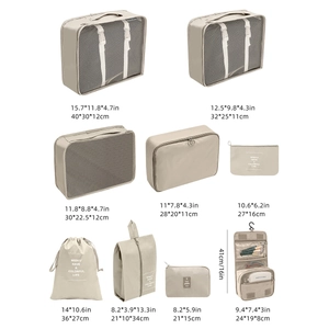 8-piece beige travel organizer set showing mesh cubes, shoe bag and sizes in cm/in