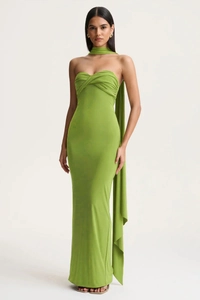 Detail of lime green maxi dress with twisted bandeau top and flowing neck scarf