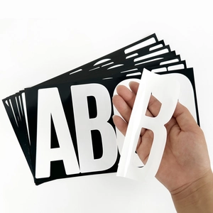 Close-up of 6-inch waterproof white vinyl letter stickers for boats and signboards
