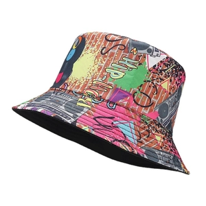 Reversible bucket hat with retro graffiti cassette print and solid black inner side