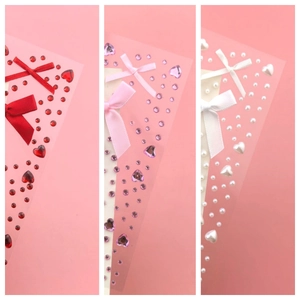 Detailed view of butterfly rhinestones and pearls for fairy eye makeup decoration