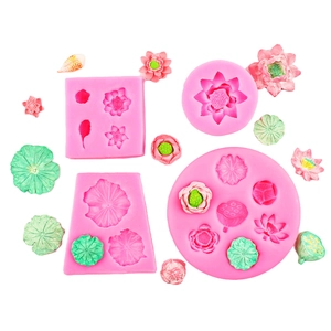 Detailed pink silicone molds for lotus flowers and lily pads with sample craft results