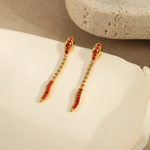 Gold snake earrings in stainless steel with red zircon crystals for women