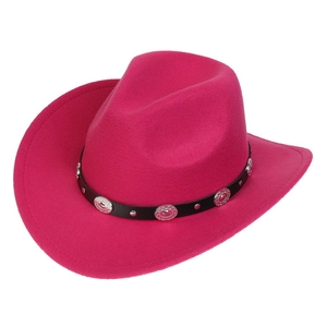 Detail of hot pink western cowboy hat featuring black decorative band with silver studs