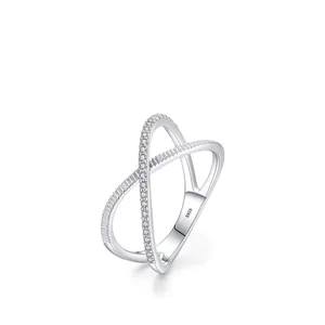 Minimalist S925 sterling silver crisscross ring with pavé cubic zirconia and gear texture