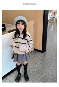 Pink plaid mini bag with pearl handle worn with grey pleated skirt for girls