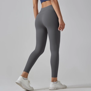 Detail of high waisted seamless dark grey yoga leggings featuring a butt lifting design
