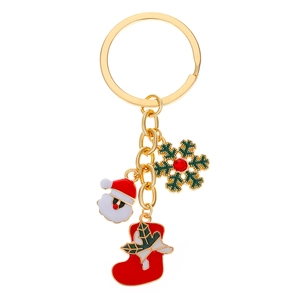 Detail of Christmas keychain with gold ring, Santa, snowflake, and festive sock pendants