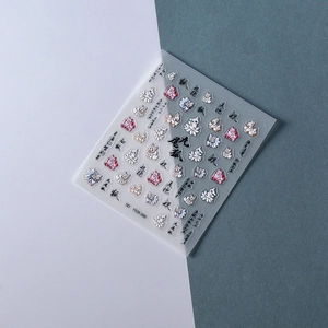 5D embossed nail stickers featuring white nine-tailed fox designs and calligraphy