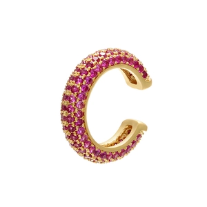 Macro shot of 18K gold plated ear cuff with pavé set pink zircon stones in a C-shape