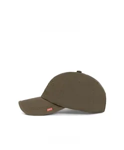 Detail view of cotton twill baseball cap in olive green with fashion label on side brim