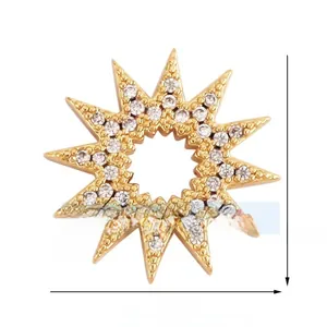 Macro shot of 16mm gold plated sunburst charm with sparkling white zircon inlays