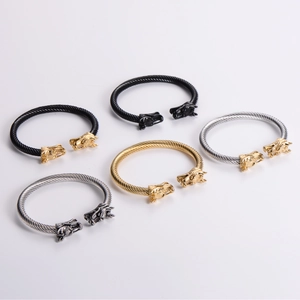 Five punk dragon head cable cuff bracelets in black, gold, and silver stainless steel