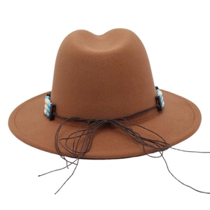 Close-up of brown wool felt jazz hat with blue beaded band and western cord detail