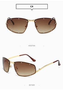Close-up of gradient brown lenses with rhinestone edges and golden metal frame details