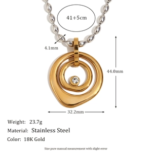 Two-tone gold and silver circular pendant necklace with crystal on bead chain link