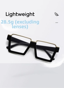 Detail view of lightweight 28.5g black and gold square frame glasses with feather accent
