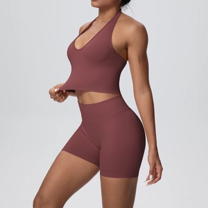 Detailed texture of ribbed seamless yoga set featuring halter top and high waist shorts