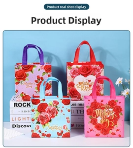 Close-up of four colorful Mother's Day non-woven gift bags with rose floral prints