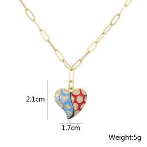Detailed view of gold necklace with red and blue enamel heart pendant showing dimensions
