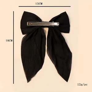 Set of 2 large black fabric bow hair clips with long streamers and silver duckbill clip