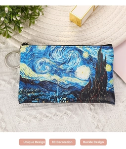Close-up of Van Gogh Starry Night oil painting print coin purse with zipper and metal ring