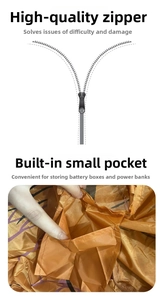 Detailed view of durable zipper and built-in pocket for battery pack on orange costume
